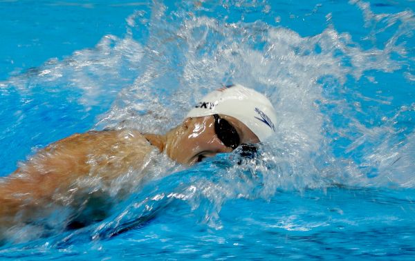 The United States Katie Ledecky competes in