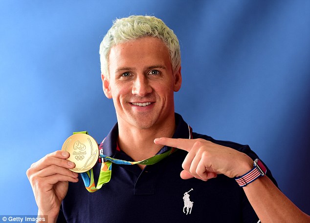 Lochte with his sole medal from Rio- a gold in the men's 4x200m freestyle relay- and sporting Ralph Lauren kit. In 2012 Fortune estimated that his endorsements net him upwards of $250,000 each