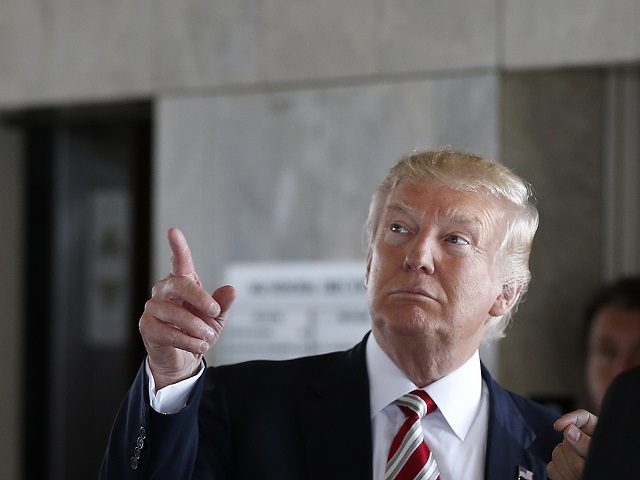 Republican presidential candidate Donald Trump gestures during a campaign stop at the Milwaukee County War Memorial Center in Milwaukee Wis. Tuesday Aug. 16 2016