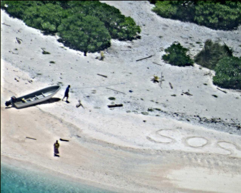 A pair of stranded mariners signal for help as a U.S. Navy P-8A Poseidon aircraft crew flies over in support of a Coast Guard search and rescue mission on an uninhabited island in Micronesia on Aug. 25 2016.U.S. Navy