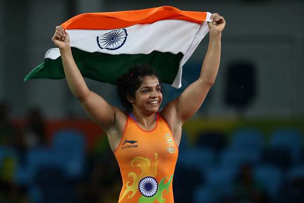 Sakshi Malik exults after winning the Bronze medal bout in her Freestyle wrestling category