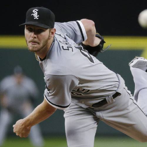 Chicago White Sox starting pitcher Chris Sale throws to a Seattle Mariners batter during a baseball game in Seattle. Sale has been scratched from his start against the Detroit Tigers after he was