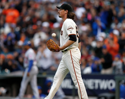 San Francisco Giants starting pitcher Jeff Samardzija heads to the mound after giving up a two-run home run against New York Mets Yoenis Cespedes in the seventh inning at AT&T Park in San Francisco Calif. on Sunday