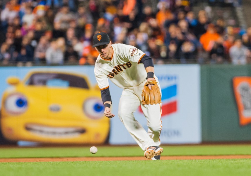 San Francisco Giants third baseman Matt Duffy tries to grab the ball with his barehand during the regular season game between the San Francisco Giants versus the Arizona Diamondbacks at AT&T Park in San Francisco CA