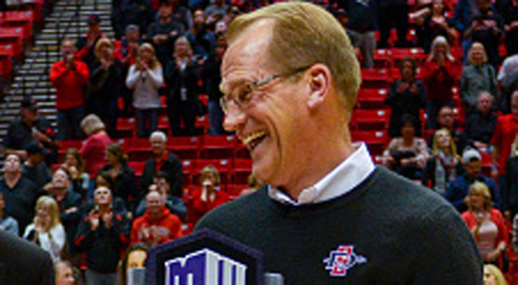 SAN DIEGO CA- MARCH 05 Head coach Steve Fisher and Athletic Director Jim Sterk of the San Diego State Aztecs celebrate with the trophy after winning the MW Conference during post game celebrations after the game against the UNLV Runnin&#039 Rebels