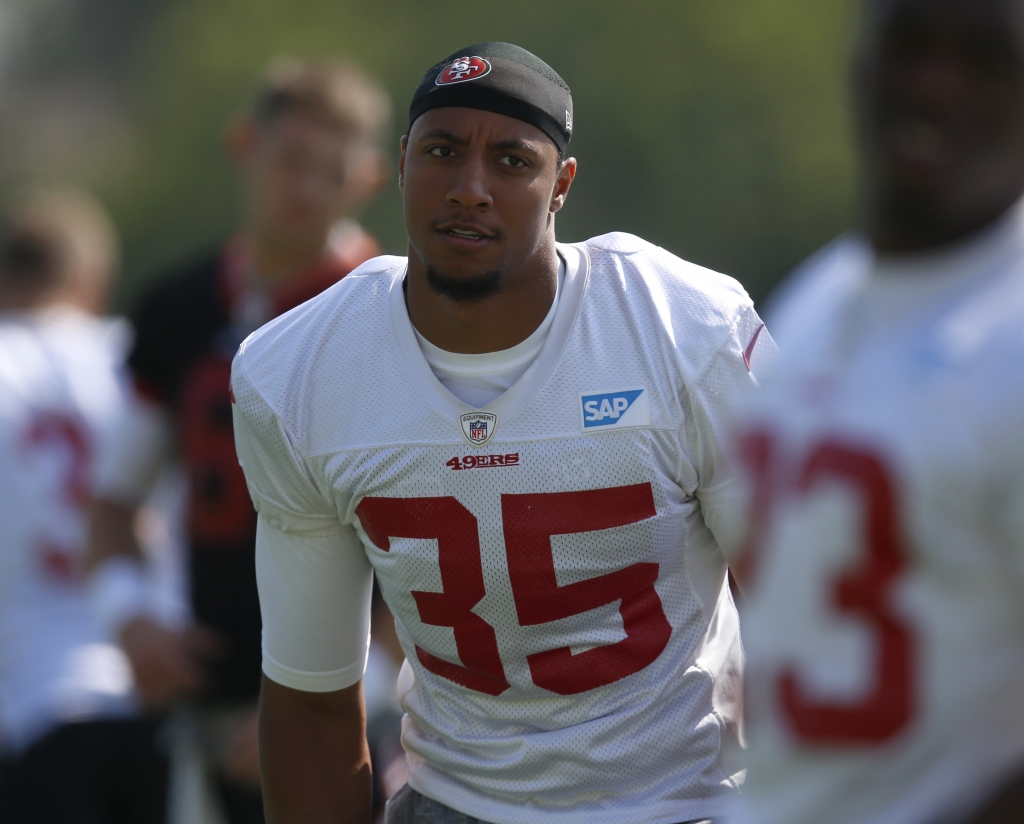 San Francisco 49ers Eric Reid stretches during the first day of training camp at the San Francisco 49ers practice facility in Santa Clara Calif. on Sunday