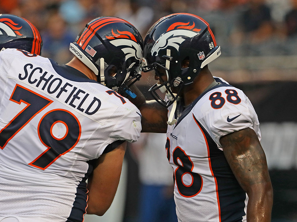 Demaryius Thomas gets a head tap from teammate Michael Schofield after catching a touchdown pass against the Chicago Bears at Soldier Field