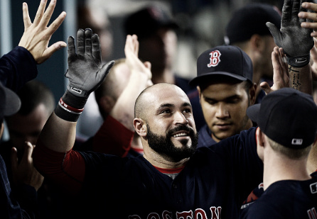 Sandy Leon celebrates with teammates after hitting a two-run homer in the fourth inning