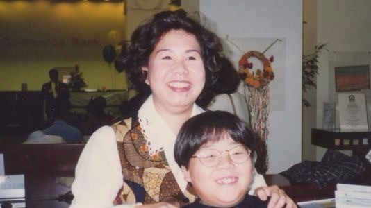 Sandy Phan Gillis with her daughter Catherine in a 1996