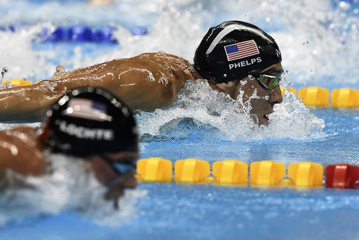 United States&#039 Ryan Lochte and United States&#039 Michael Phelps right compete during a men's 200-meter individual medley semifinal during the swimming competitions at the 2016 Summer Olympics Wednesday Aug. 10 2016 in Rio de Janeiro Bra