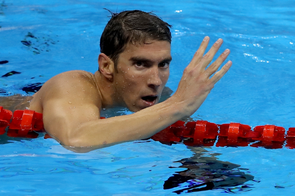 Michael Phelps of the United States celebrates winning the Men's 200m Individual Medley Final on Day 6 of the Rio 2016 Olympic Games at the Olympic Aquatics Stadium