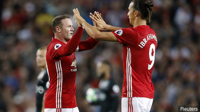 Manchester United's Zlatan Ibrahimovic celebrates with Wayne Rooney after scoring their first goal