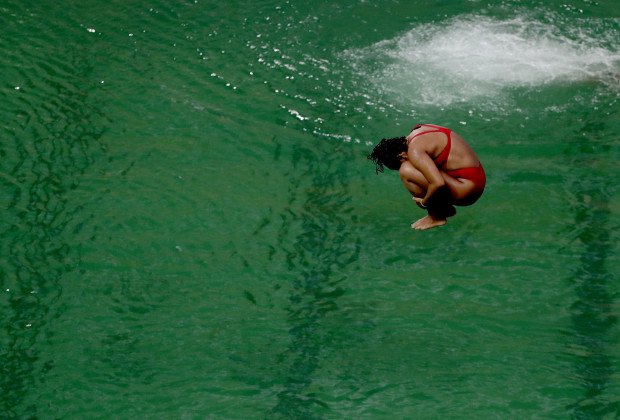 A diver takes part in a training session after the water in the diving pool turned green in the Maria Lenk Aquatic Center at the 2016 Summer Olympics in Rio de Janeiro Brazil Wednesday Aug. 10 2016