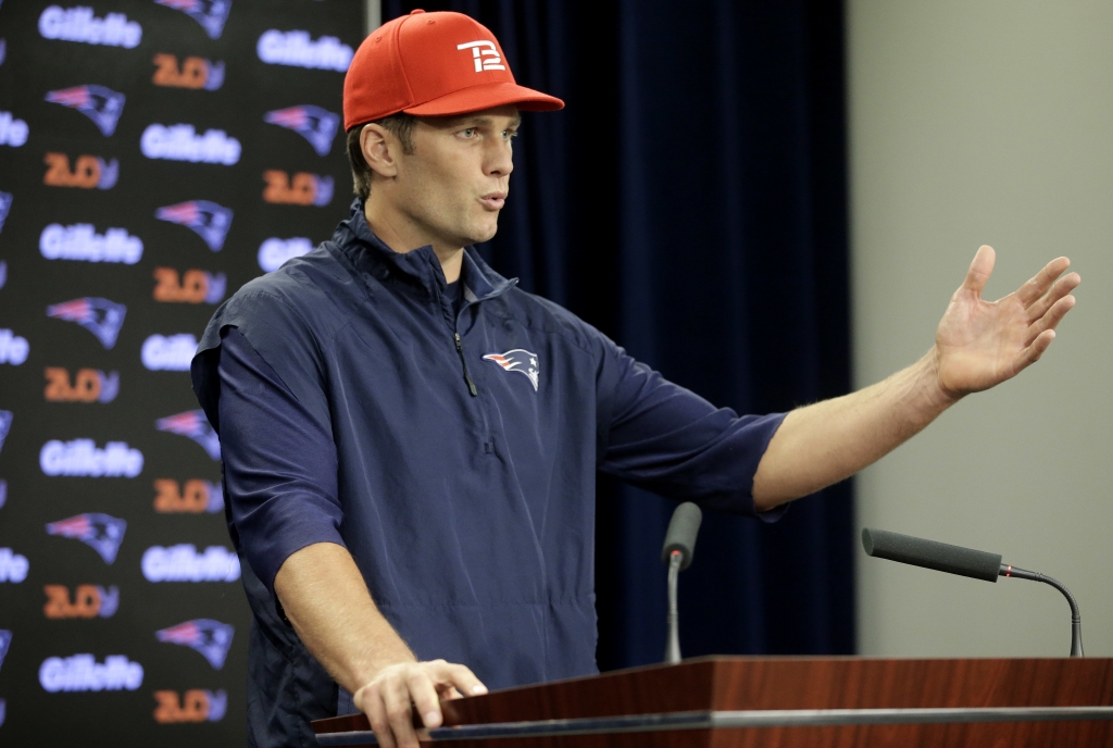 New England Patriots quarterback Tom Brady takes questions from members of the media during a news conference before a scheduled NFL football training camp practice Tuesday Aug. 23 2016 in Foxborough Mass. Brady says he's ready to play after a's