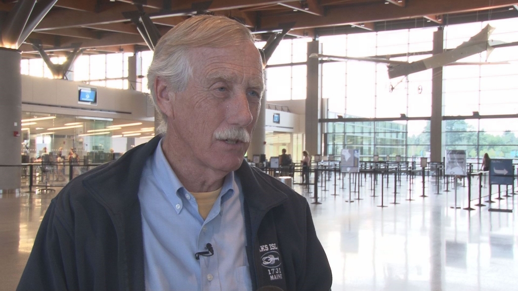 Sen. Angus King gives a press conference at the Portland International Jetport