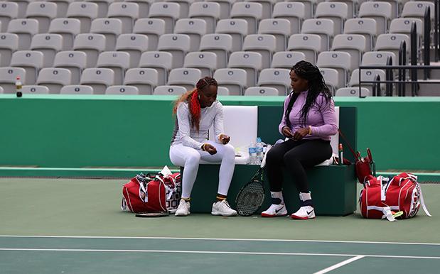 Serena Williams of the United States reacts after losing a point at the net in a doubles match with her sister Venus rear against Lucie Safarova and Barbora Strycova of the Czech Republic at the 2016 Summer Olympics in Rio de Janeiro Brazil Sunday