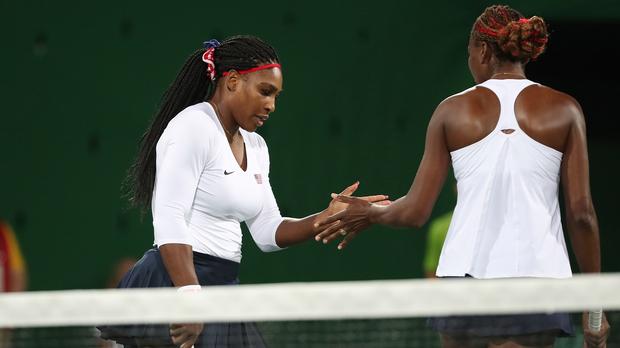 Serena and Venus Williams suffered the first loss of their Olympics doubles career Sunday.                     USATSI