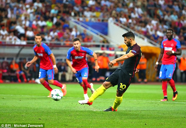 Sergio Aguero sends his second penalty in Bucharest against goalkeeper Florin Nita's bar