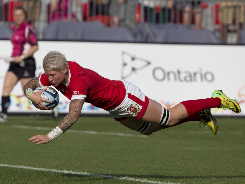 Canada's captain Jen Kish dives over to score in Canada's 55-7 win over USA in the women's rugby sevens gold medal game at the 2015 Pan Am games in Toronto on Sunday