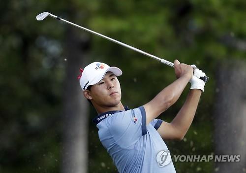 Kim Si-woo of South Korea watches his tee shot on the 16th hole during the final round of the Wyndham Championship in Greensboro North Carolina on Aug. 21 2016