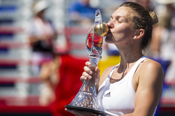 Simona Halep kisses the Coupe Rogers trophy in Montreal  Getty Images