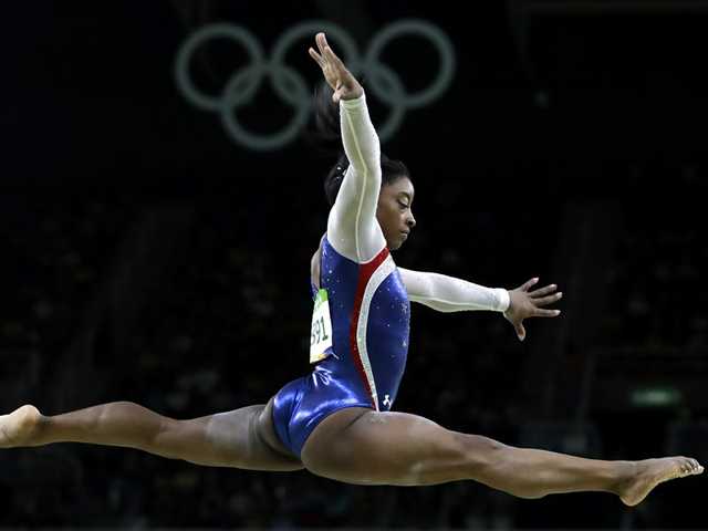 Biles soars to all-around gymnastics title