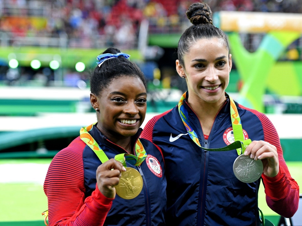 Simone Biles captured gold and Aly Raisman claimed silver in women's individual all-around gymnastics. Robert Hanashiro USA TODAY Sports