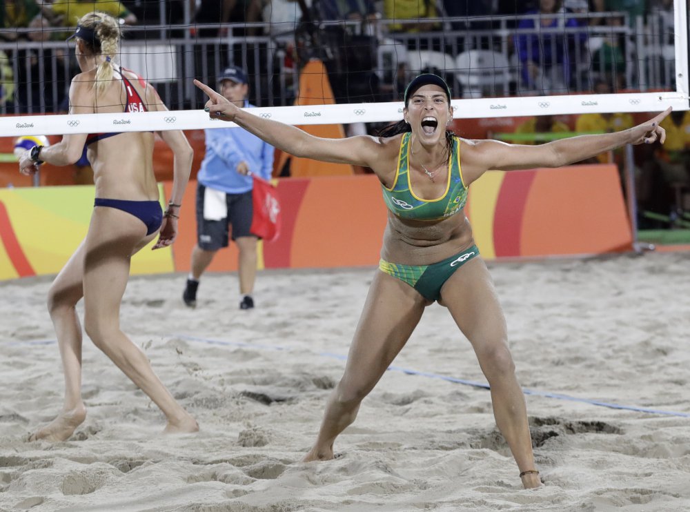 Brazil's Agatha Bednarczuk celebrates winning a point during a women's beach volleyball semifinal match against United States at the 2016 Summer Olympics in Rio de Janeiro Brazil on Wednesday