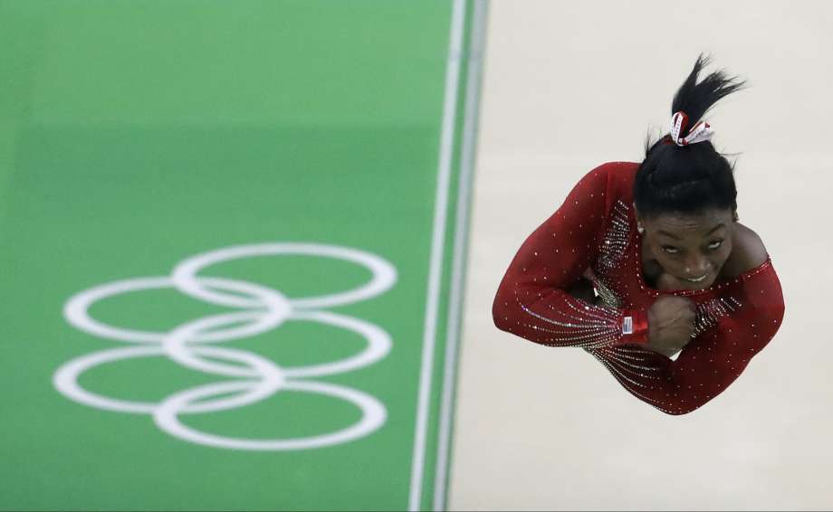 U.S. gymnast Simone Biles performs on the vault. She won gold on the apparatus giving her 17 world or Olympic medals