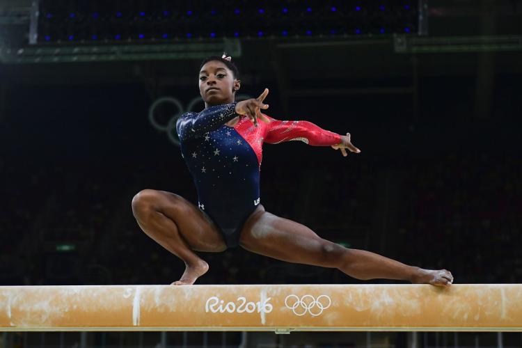 Simone Biles remains in the Olympic spotlight despite family tension