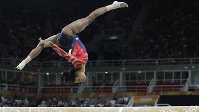 United States&#039 Gabrielle Douglas performs on the balance beam during the artistic gymnastics women's qualification at the 2016 Summer Olympics in Rio de Janeiro Brazil Sunday Aug. 7 2016