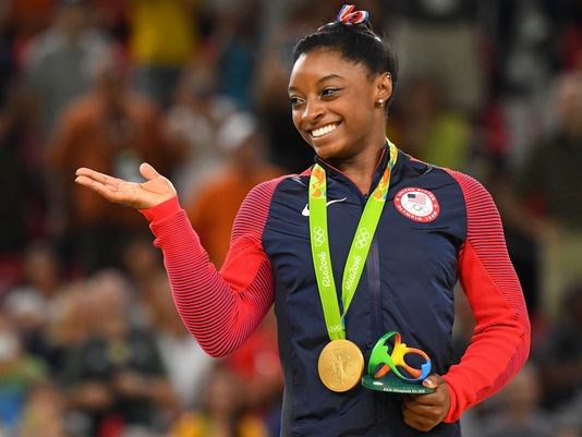 Simone Biles with her fourth gold medal of the Games