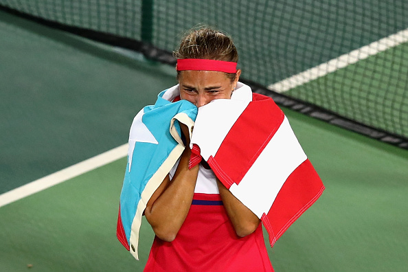 Monica Puig of Puerto Rico reacts after defeating Angelique Kerber of Germany in the Women's Singles Gold Medal Match on Day 8 of the Rio 2016 Olympic Games at the Olympic Tennis Centre