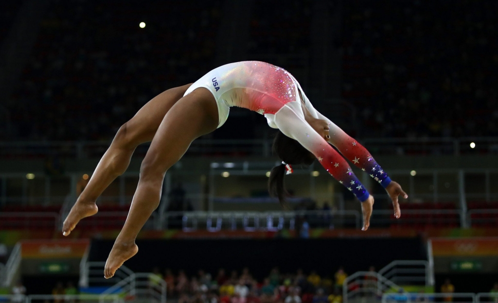 RIO DE JANEIRO BRAZIL- AUGUST 17 Simone Biles of the United States performs on the beam during the Gymnastics Rio Gala on Day 12 of the 2016 Rio Olympic Games