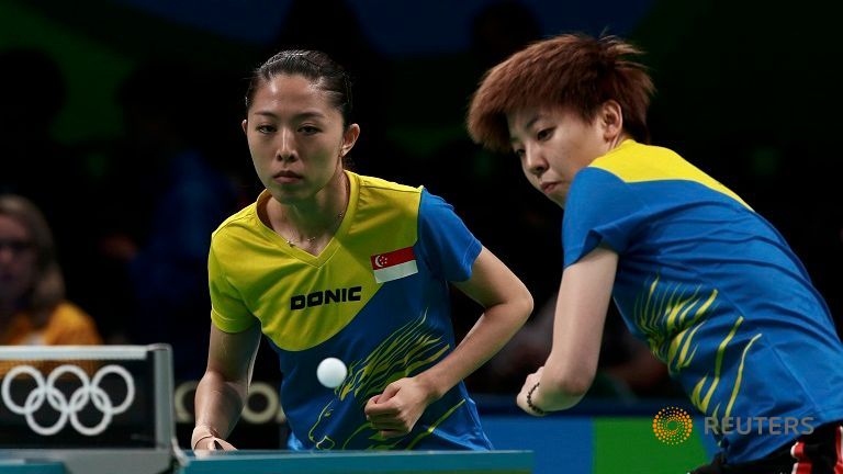 Singapore paddlers Yu Mengyu and Zhou Yihan in action at the Rio Olympic games.      
   Enlarge  Caption