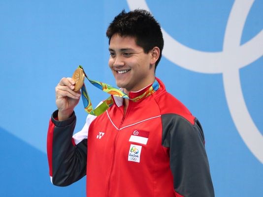 Singapore's Joseph Schooling scored a medal and cash in the 100-meter butterfly at the Rio Olympics