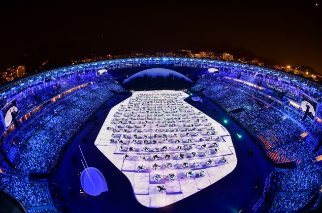 The Maracana stadium lights up in blue during the beginning of the opening ceremony of the Rio 2016 Olympic Games in Rio de Janeiro