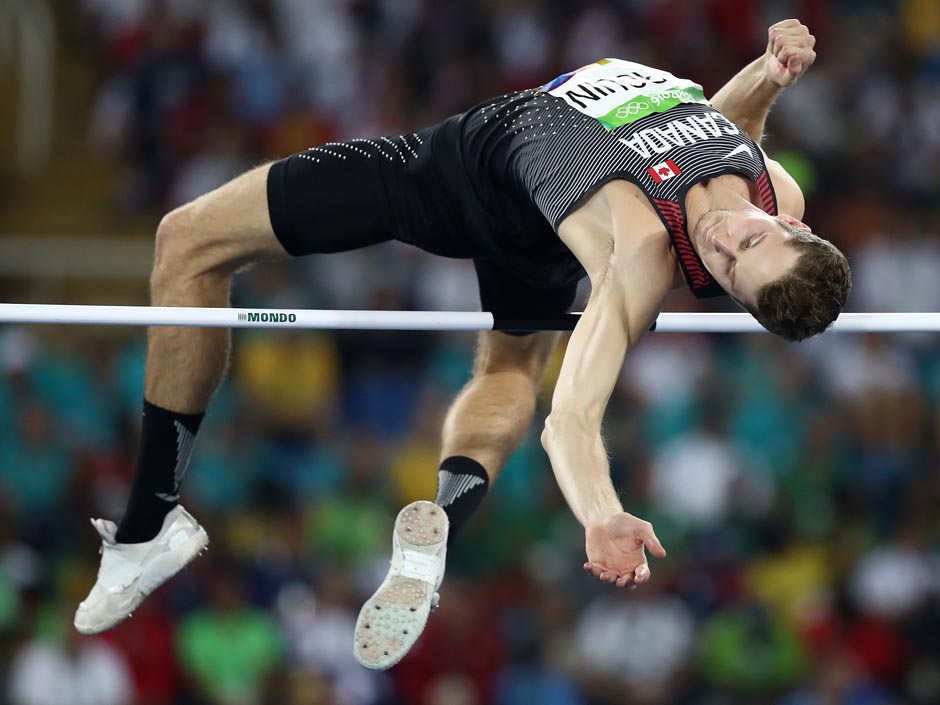 Derek Drouin of Canada competes in the men's high jump qualification on at the Olympic Stadium in Rio de Janeiro Brazil on Sunday Aug. 14 2016