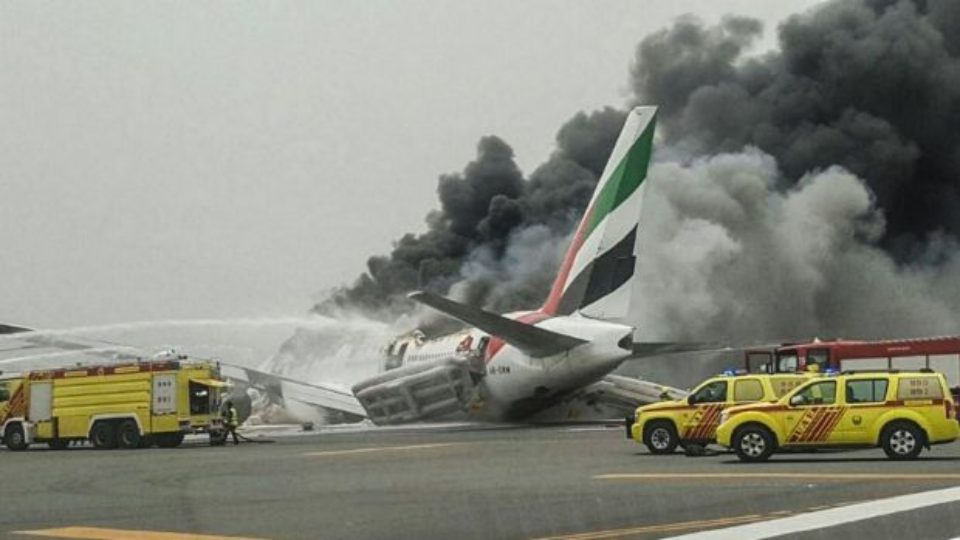 Smoke billows from the Emirates flight