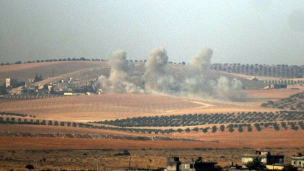 Smoke billows in Syrian side