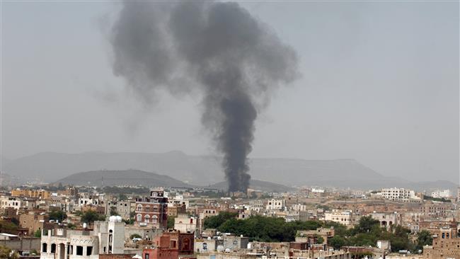 Smoke rises from a snack food factory after a Saudi airstrike hit it in Sana’a Yemen