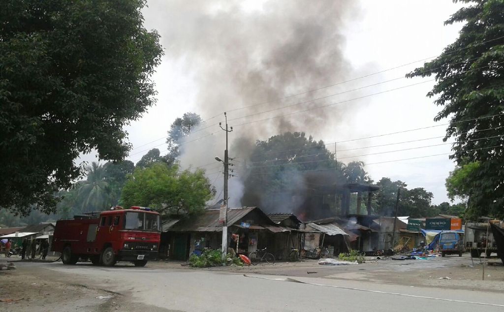 Smoke rises from the site of a militant attack at Balajan Tinali in the Kokrajhar district of India's north-eastern Assam state