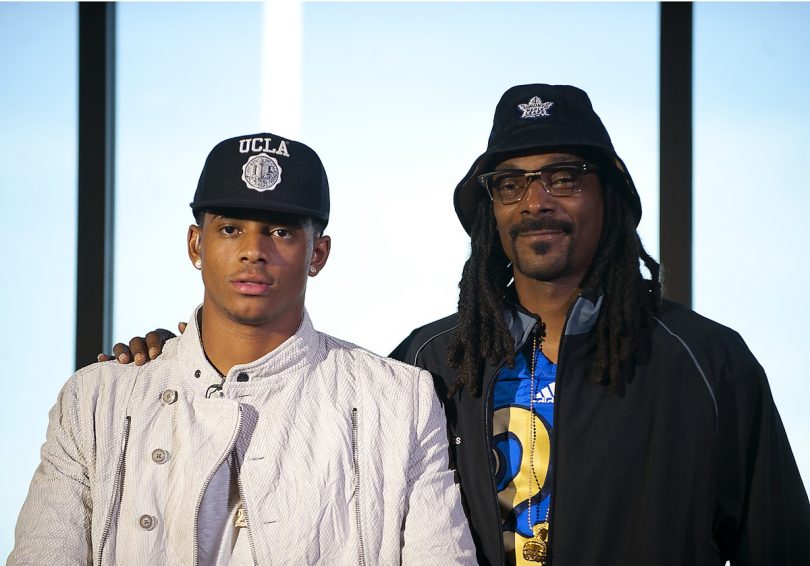 Feb 4 2015 Las Vegas NV USA Recording artist Snoop Dogg stands beside his son Cordell Broadus who announced his commitment to UCLA during a press conference at Bishop Gorman High School. Mandatory Credit Stephen R. Sylvanie-USA TODAY Sports