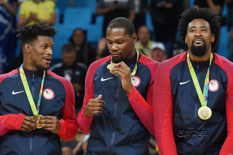 Gold medallists USA's guard Kyle Lowry, USA's guard Kevin Durant and USA's centre