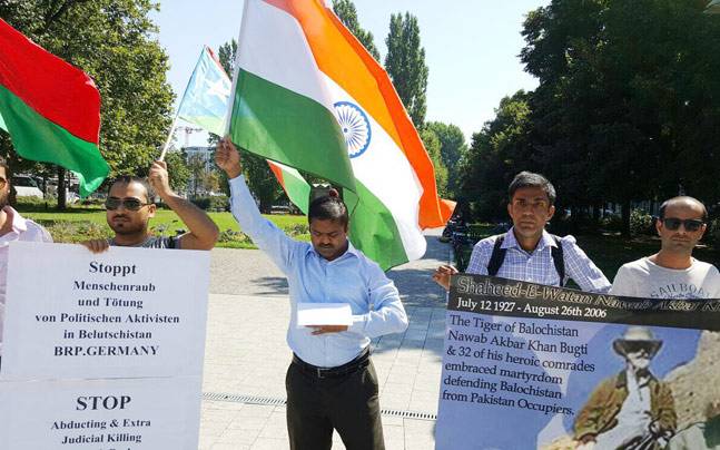 Some of the protesters carried Indian Tri-colour