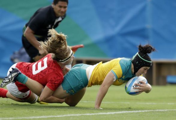 Australia's Emilee Cherry right scores a try