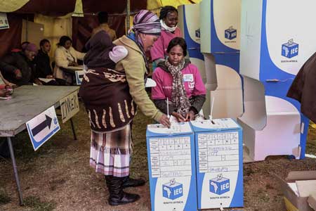 RULING PARTY FACES CHALLENGE A South African woman casts her ballot during the Municipal elections in Alexandra Township on Wednesday in Johannesburg South Africa. South Africans voted in closely-contested municipal elections that could deal a heavy blow