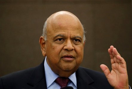 South African Finance Minister Pravin Gordhan reacts during a media briefing in Sandton near Johannesburg