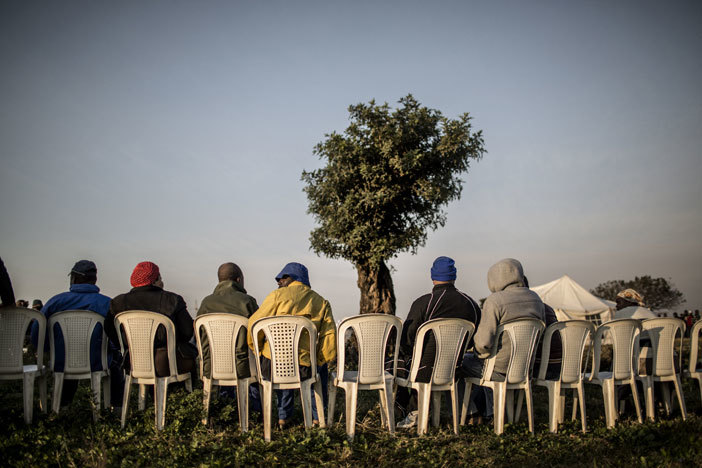 South African voters wait at a polling station