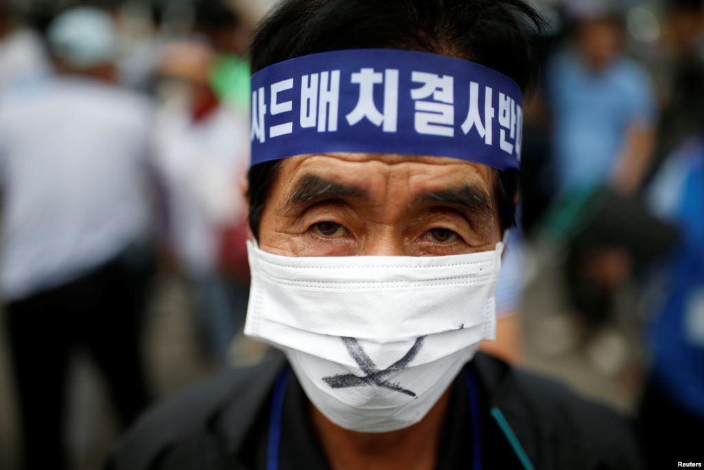 A Seoungju resident takes part in a protest against the government's decision on deploying a U.S. THAAD anti-missile defense unit in Seongju in Seoul South Korea